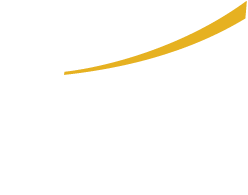 Two people on a suspension bridge stretching across a canyon